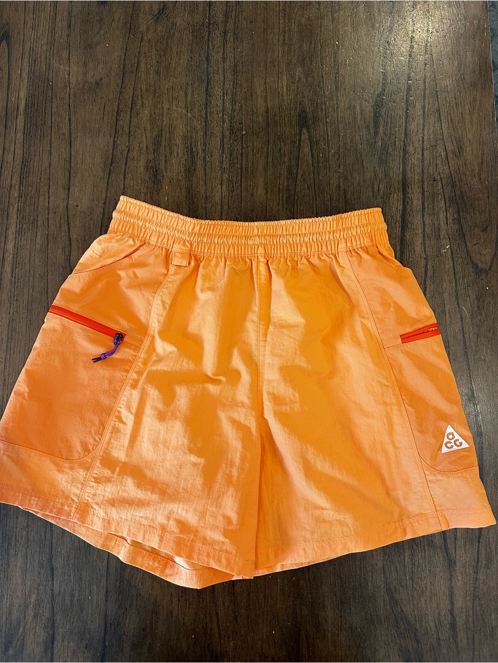 Nike ACG “Death Bloom” Women’s Woven Utility Shorts Orange Size Small NWT